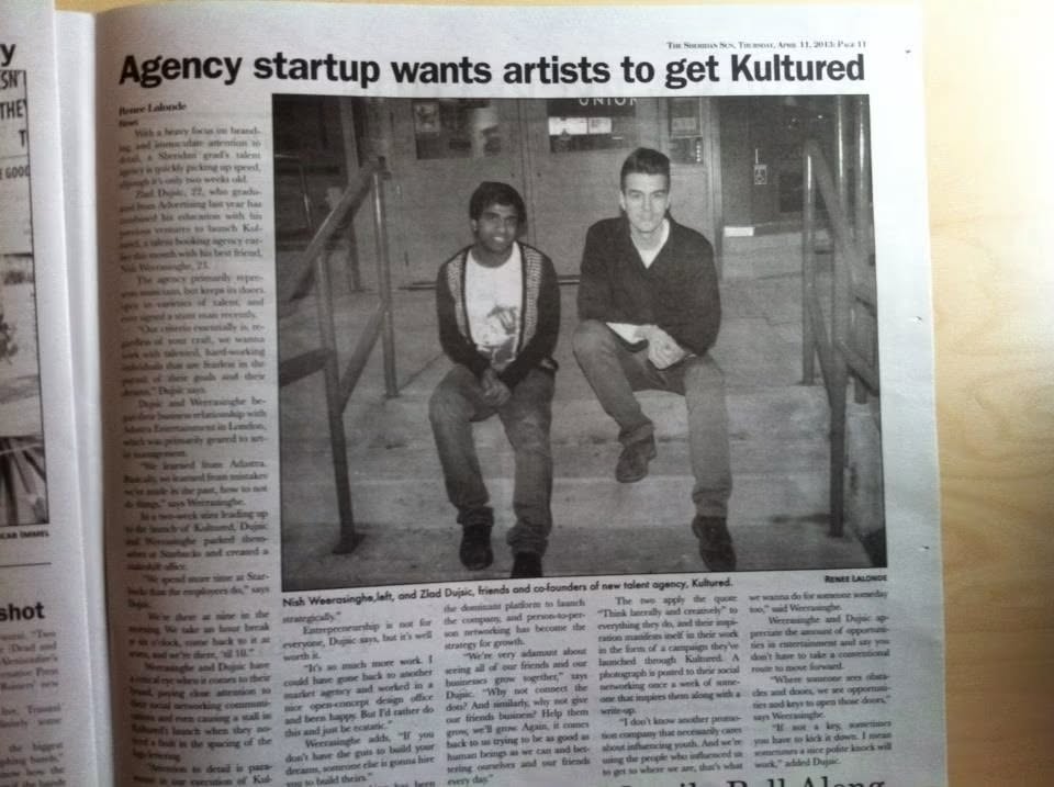 Newspaper feature titled ‘Agency startup wants artists to get Kultured,’ with a photograph of the agency’s co-founders.